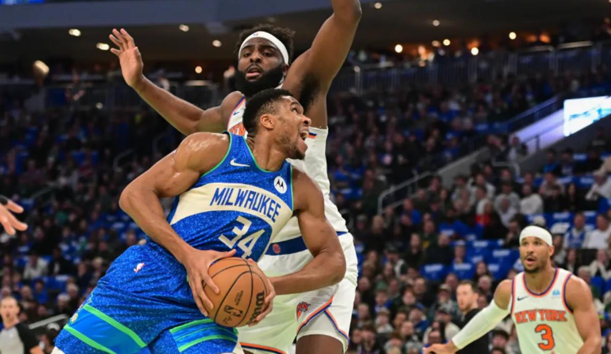Mitchell Robinson guards Giannis Antetokounmpo during last week's quarterfinal